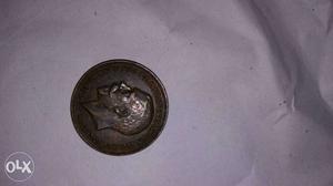 Round Silver-colored Male Profile Coin