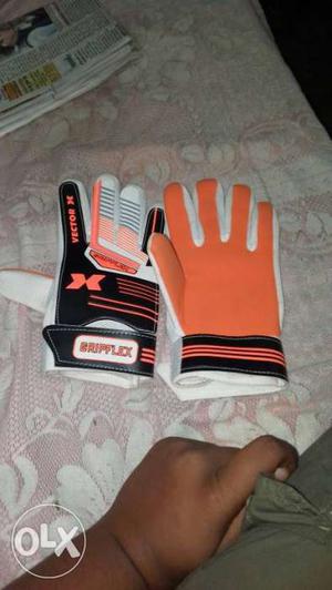 White-black-and-orange Vector X Goalkeeper Gloves