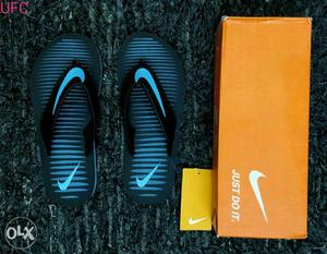 Black-and-blue Nike Slide Sandals