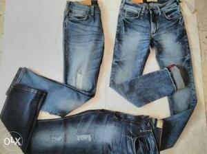 Blue Denim Jeans And Gray Denim Jeans