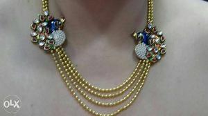 Gold-colored Multi Strand Necklace