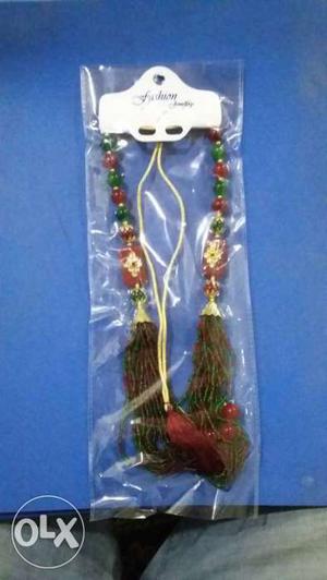 Green And Red Beaded Accessory