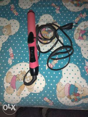 It is a straightener and curler. this is a two in