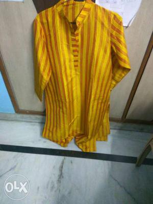 Kurta yellow colour size - 38 available for sale.