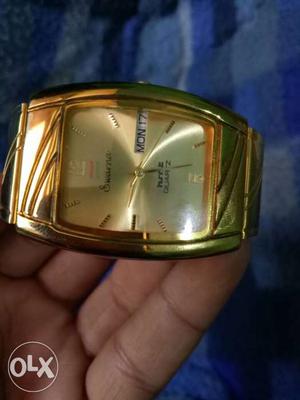 New watch gold colour HMT water resistant