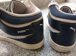 PUMA raised ankle sneakers in a very good
