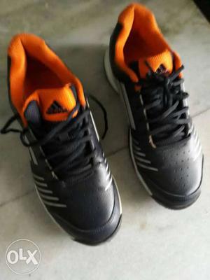 Pair Of Black-and-orange Adidas Low-top Sneakers size 7