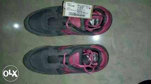 Pair Of Black-and-pink Running Shoes