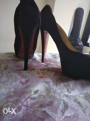 Pair Of Black-and-red Stilettos