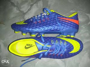 Pair Of Blue Nike Cleats