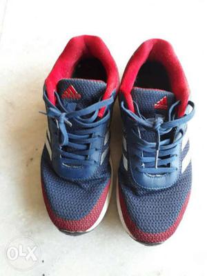 Pair Of Blue-and-red Adidas Low-top Sneakers
