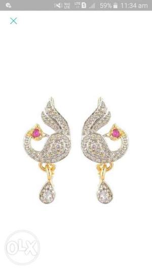 Pair Of Silver-colored And Gold-colored Bird Figure Earrings