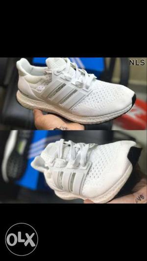 Pair Of White Adidas Running Shoes