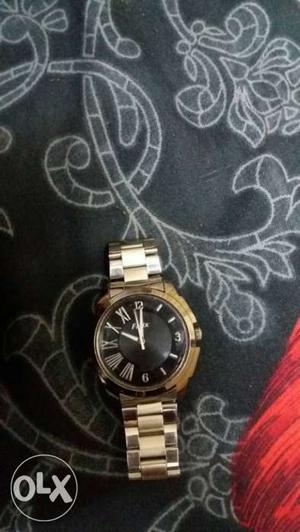 Round black fizix watch and silver chain