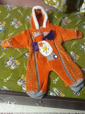 Toddler's Orange And White Footie Pajama