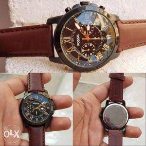 Two Round Black Chronograph Watches With Brown Leather
