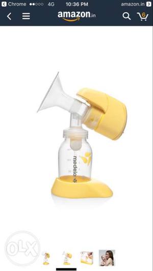 Yellow And White Medela Plastic Breastpump
