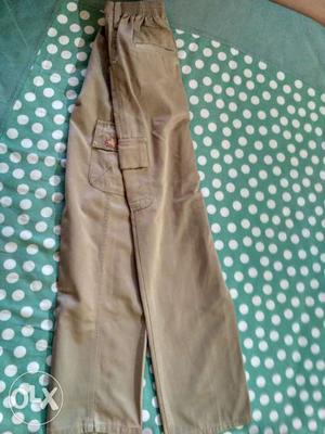 Beige colour 2 pants which can be wearable in