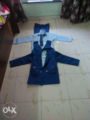 Brand new four piece or coat,shirt,jacket,tie and