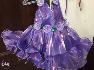Lovely lavender frock for one year kids.