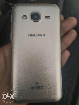 Samsung j2 with back cover charger and mobile box