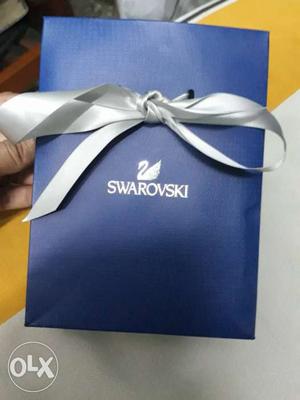 This is a brand new Swarovski pen of worth .