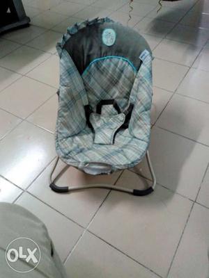 Toddler's Gray, Blue, And Black Plaid Bouncer Seat