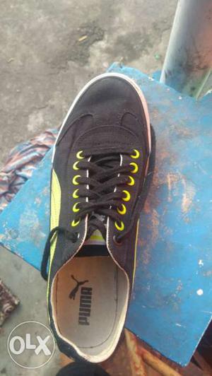 Black And Yellow Puma used Low-top Sneaker