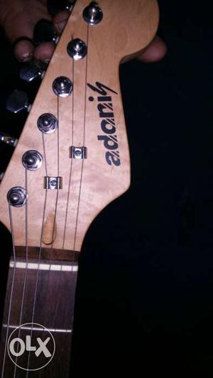 Brown Adonis Guitar Head Stock