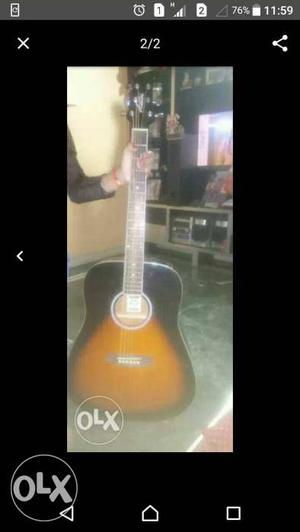 Brown And Black Acoustic Guitar Screenshot