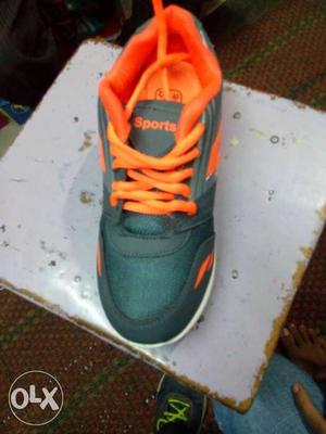 Gray And Orange Low Top Sneaker