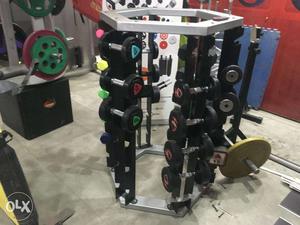 Gym equipments{dumbbels,olympic rod,plates.machines all