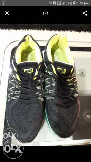 Pair Of Black-and-green Nike Running Shoes With Box