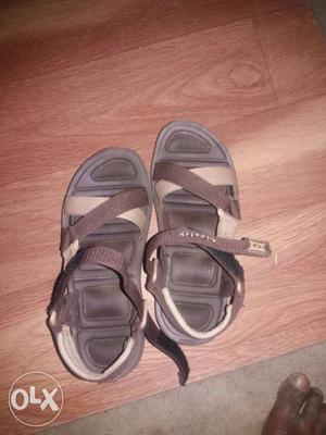 Pair Of Gray-and-brown Sandals
