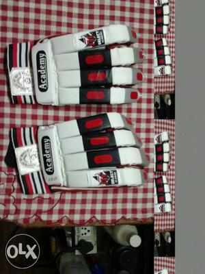 Pair Of White-black-and-red Academy Sports Gloves