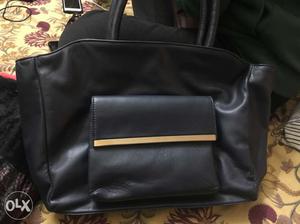 Pure leather Handbag, no brand, only serious