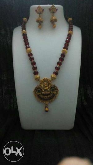 Red crystal mala with beautifjl Lakshmi pendant