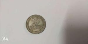 Round Silver-colored 25 India Rupees Coin