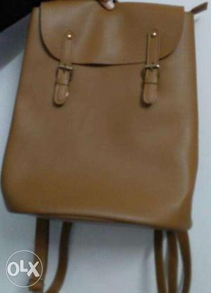 Tan color women leather backpack