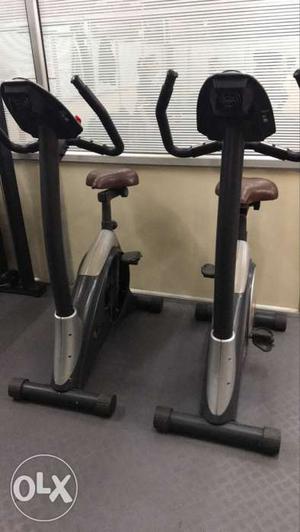 Two Grey-and-black Stationary Bike