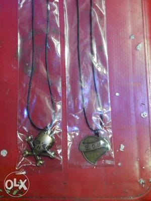 Two Skull And Heart Pendants Black Leather Necklaces