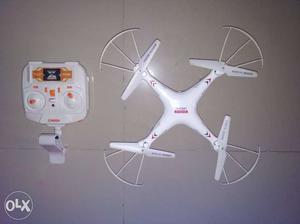 White Quadcopter Drone With Remote Control