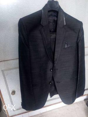 2piece suit of dark grey color,one tym used nd in
