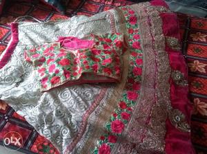 Golden lehenga with pink dupatta at very