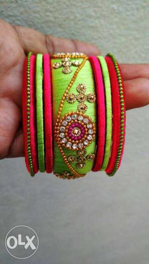 Green and pink thread Bangles by Hand Made. 2sets