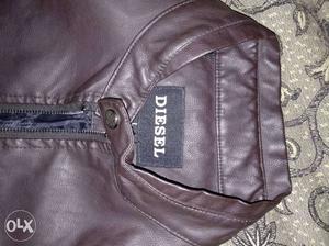 Its a pure leather jacket brand new brown color
