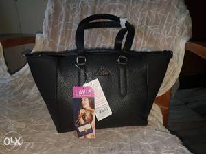 Lavie handbag black and off white color for sale.