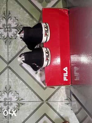 Pair Of Black Fila Low-top Shoes