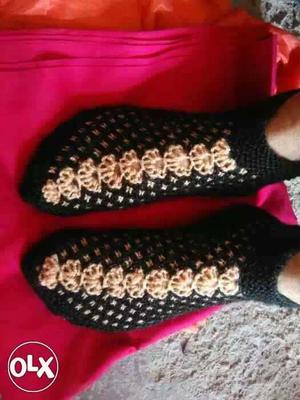 Pair Of Black Knitted Shoes