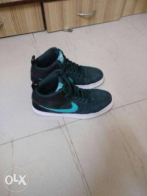 Pair Of Black-white-teal Nike High-top Sneakers